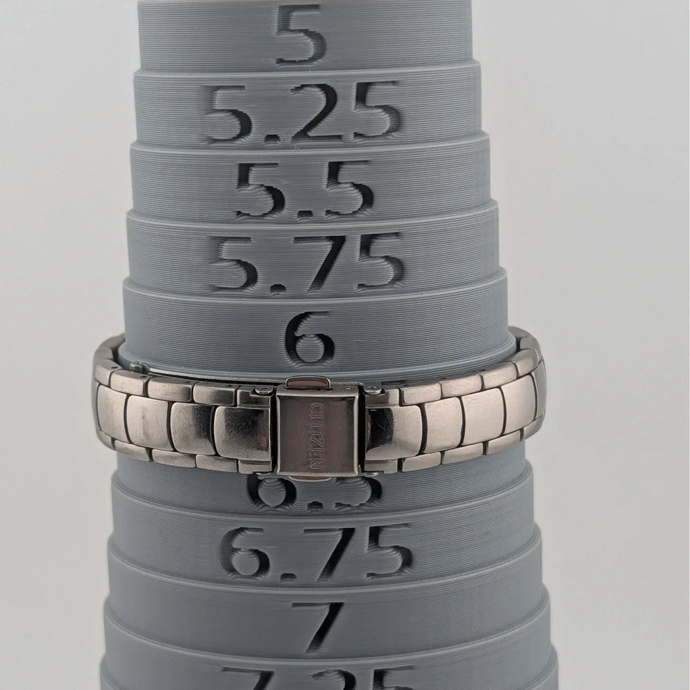 Citizen Eco-Drive Titanium E001-K18451 Women's WR100 Day Date Black Dial Watch